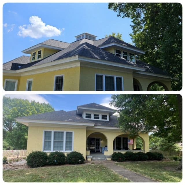 Beautiful two-story yellow home with a modern roof and lush greenery in the foreground.